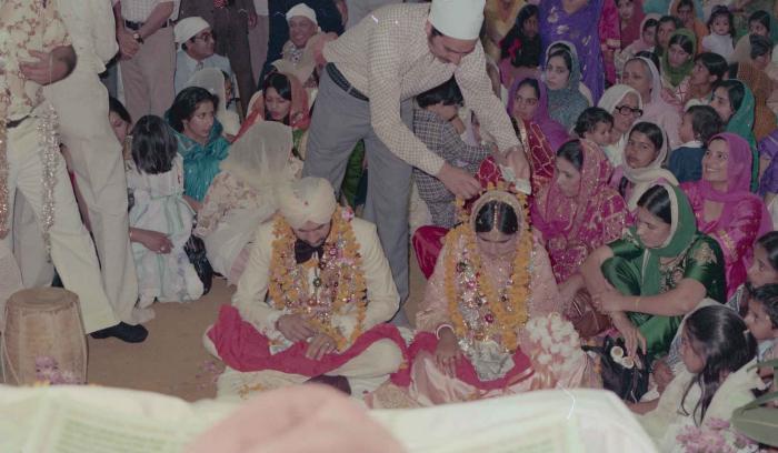 [Photo of Harbans Singh and Rupinder Toor]