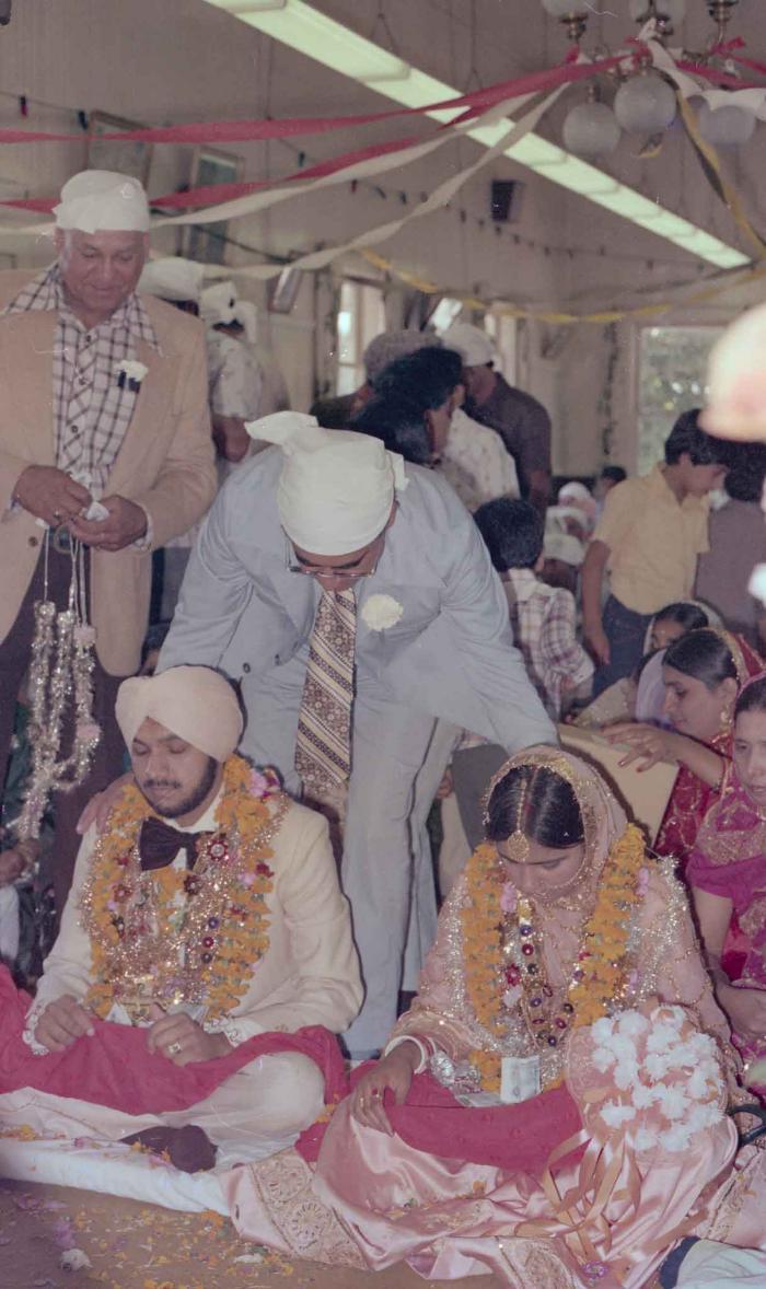 [Photo of Harbans Singh and Rupinder Toor]