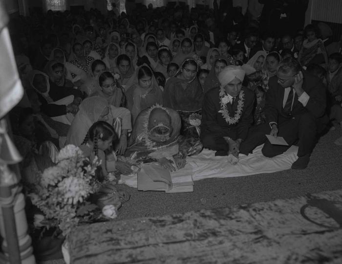 [Group photo of the Gill couple with family members]