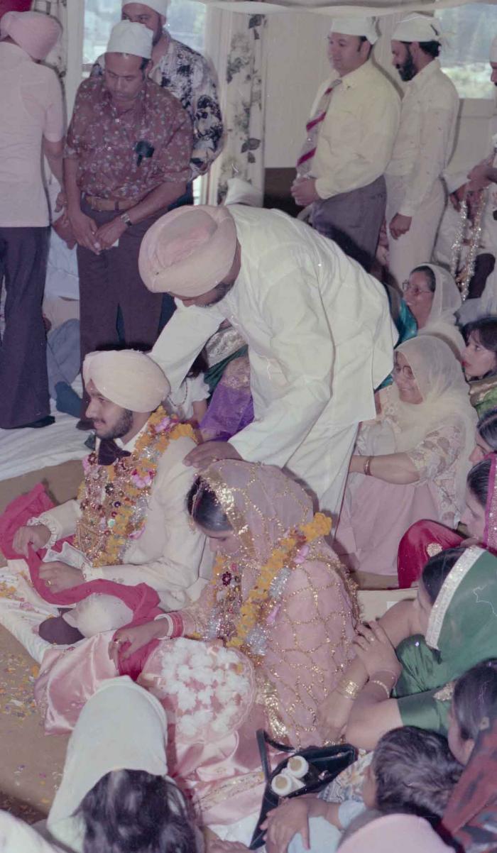 [Photo of Harbans Singh and Rupinder Toor]