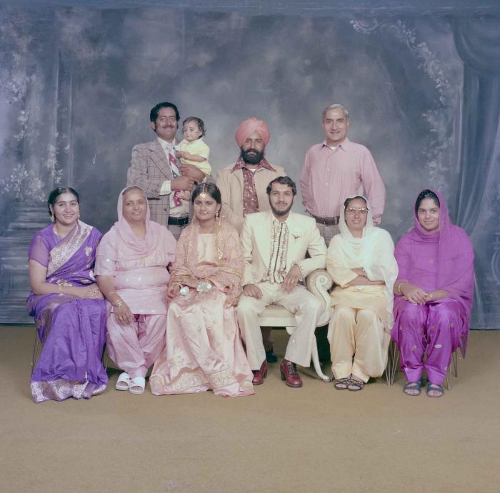 [Group photo of Rupinder Toor and Harbans Singh Grewal with their family members]