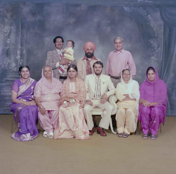 [Group photo of Rupinder Toor and Harbans Singh Grewal with their family members]