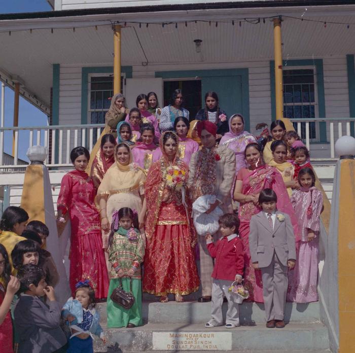 [Group photo of Gurnek Rai and Rarsini Bassi with their family members]