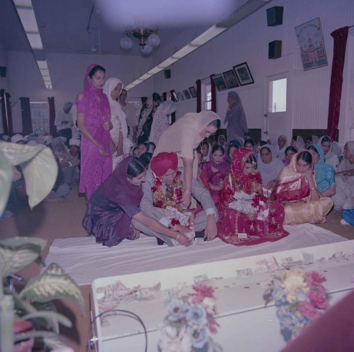 [Photo of Sinder Brar and Ranjit Guron]