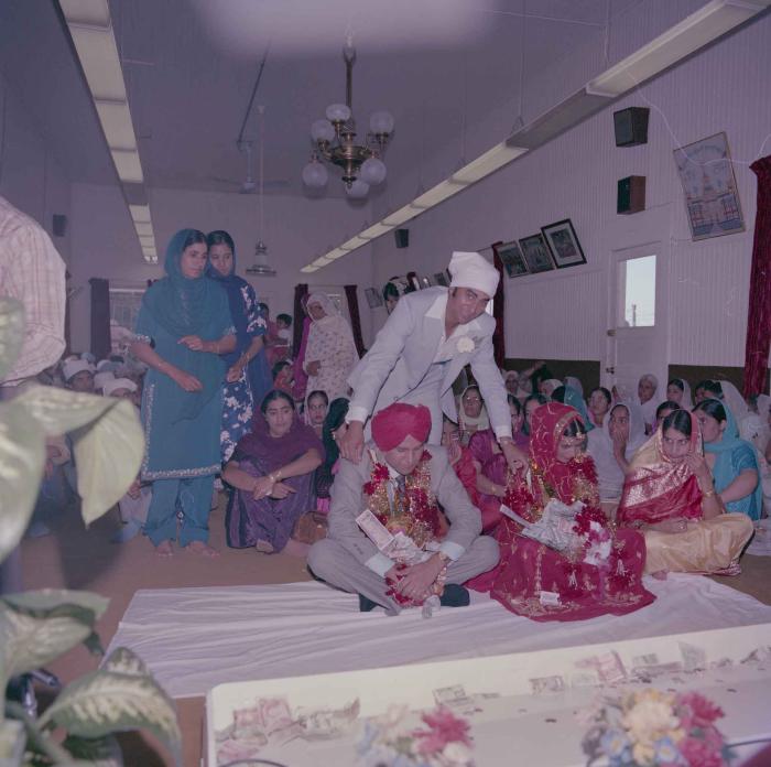 [Photo of Sinder Brar and Ranjit Guron]