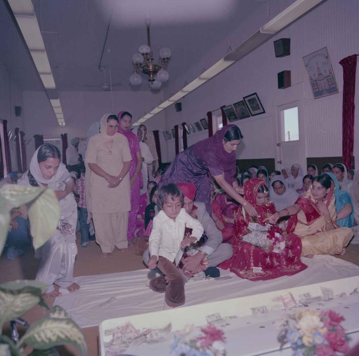 [Photo of Sinder Brar and Ranjit Guron]