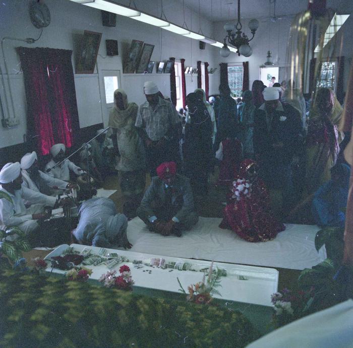 [Photo of Sinder Brar and Ranjit Guron]