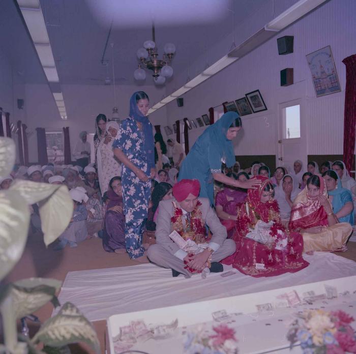 [Photo of Sinder Brar and Ranjit Guron]