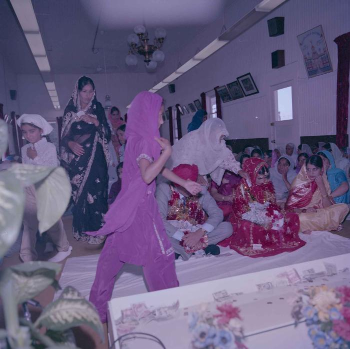 [Photo of Sinder Brar and Ranjit Guron]