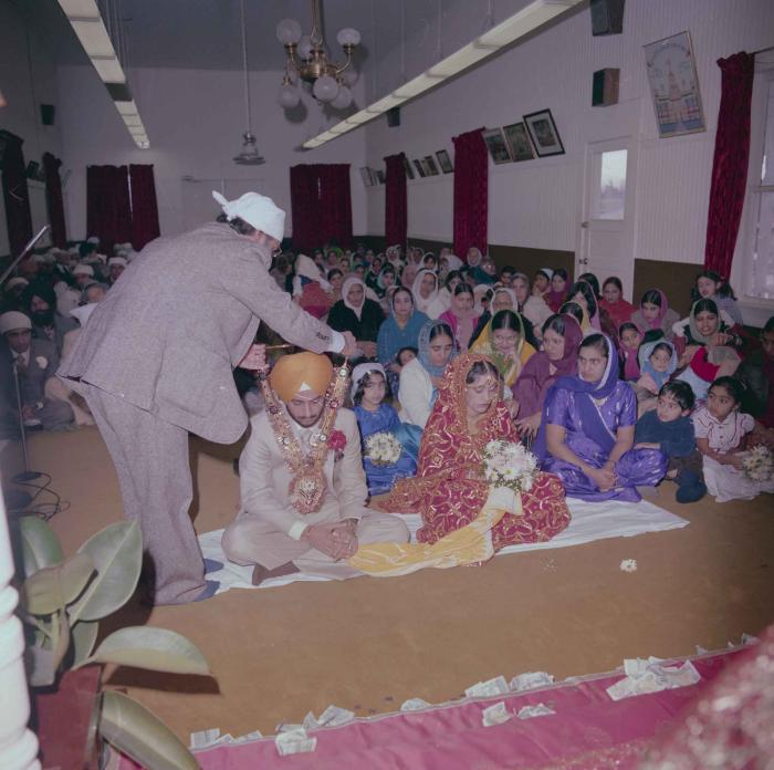 [Photo of Pushpinder Maan and Gurpreet Virk]