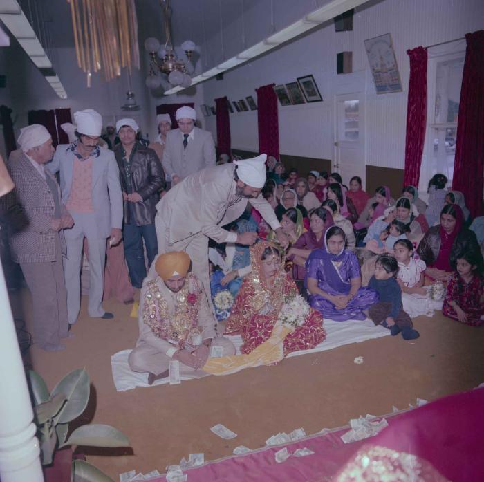 [Photo of Pushpinder Maan and Gurpreet Virk]