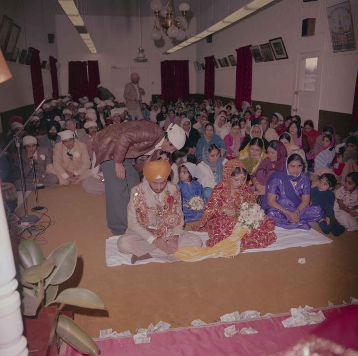 [Photo of Pushpinder Maan and Gurpreet Virk]