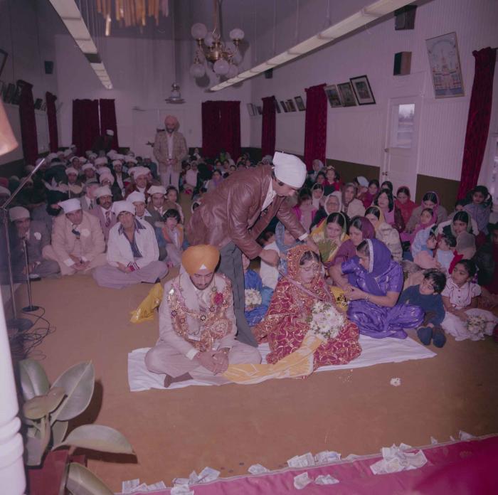 [Photo of Pushpinder Maan and Gurpreet Virk]