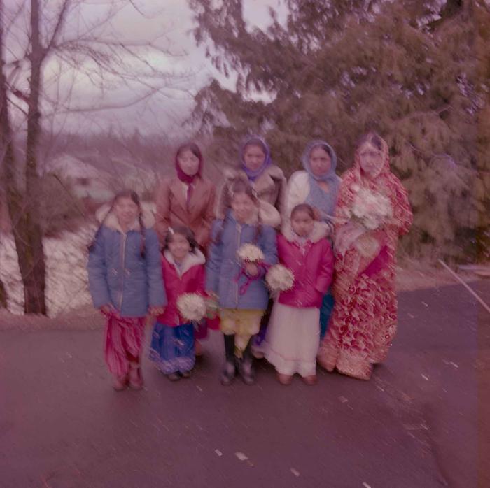 [Photo of Pushpinder Maan with unidentified women]