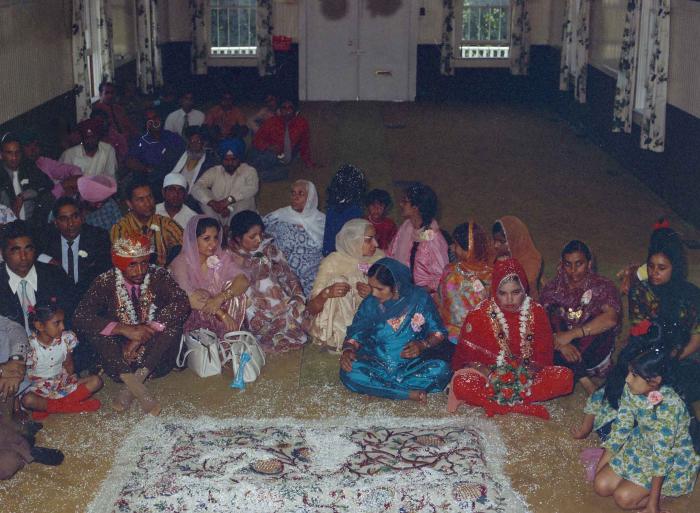 [Photo of Karen Gurmail and Harcharn Singh]