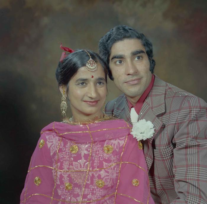 [Photo of Harcharn Gill and Barbinder Gill]