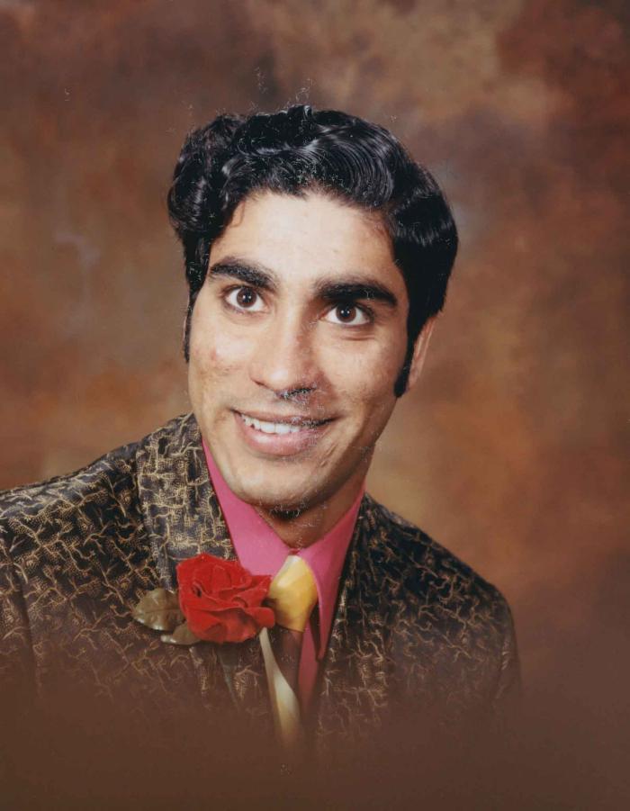 [Photo of Harcharn Gill]