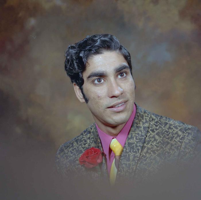[Photo of Harcharn Gill]
