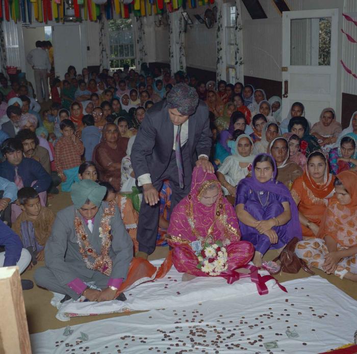 [Photo of Jaginder Singh Gill and Amarjit Gill]