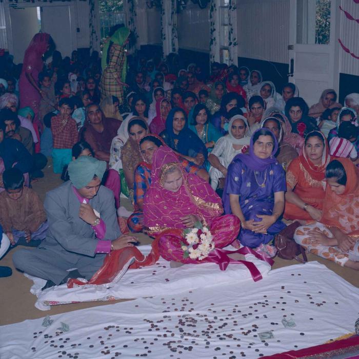 [Photo of Jaginder Singh Gill and Amarjit Gill]