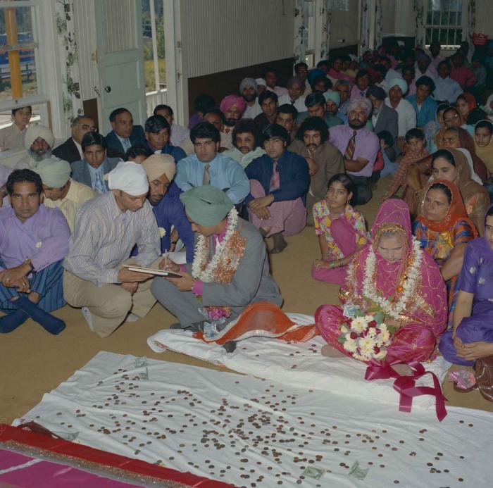 [Photo of Jaginder Singh Gill and Amarjit Gill]