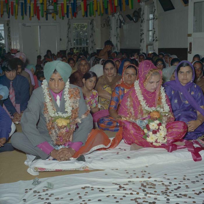 [Photo of Jaginder Singh Gill and Amarjit Gill]