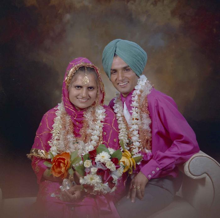[Photo of Jaginder Singh Gill and Amarjit Gill]