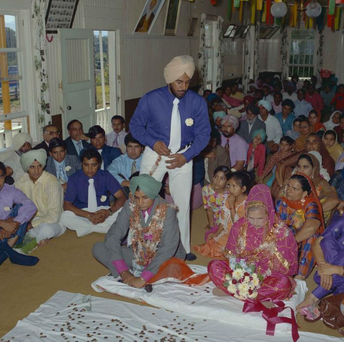 [Photo of Jaginder Singh Gill and Amarjit Gill]