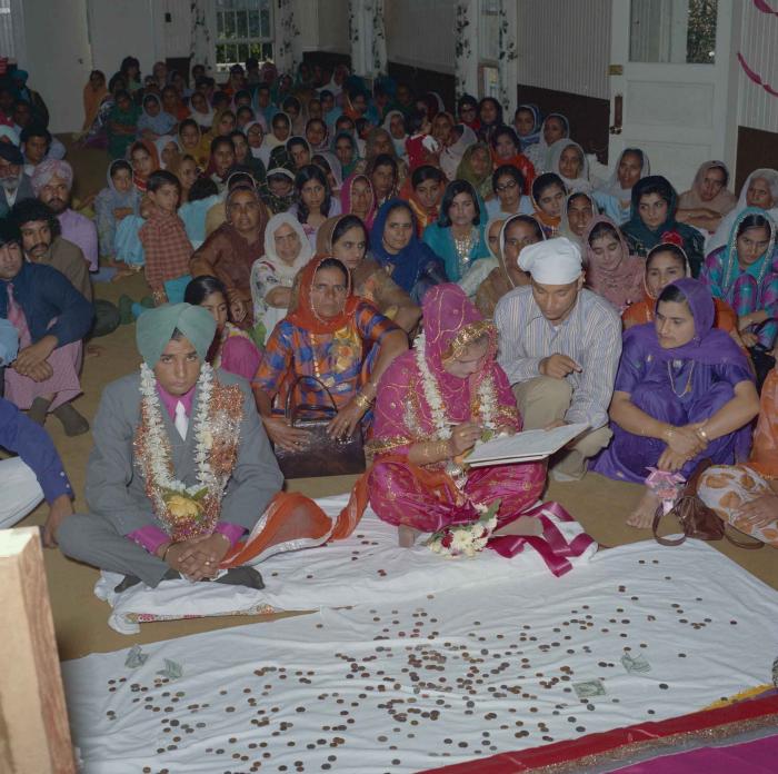 [Photo of Jaginder Singh Gill and Amarjit Gill]
