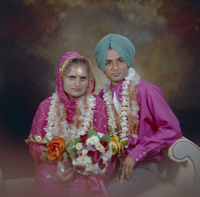 [Photo of Jaginder Singh Gill and Amarjit Gill]