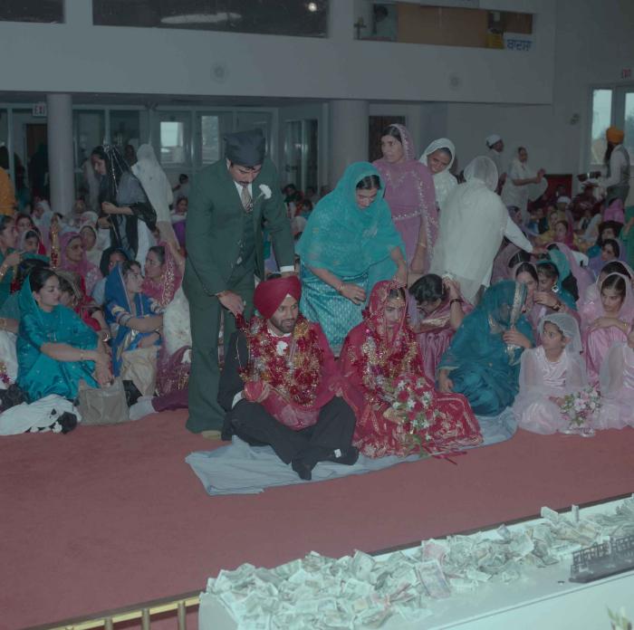 [Photo of Charan Kaila and Karmjit Gill]