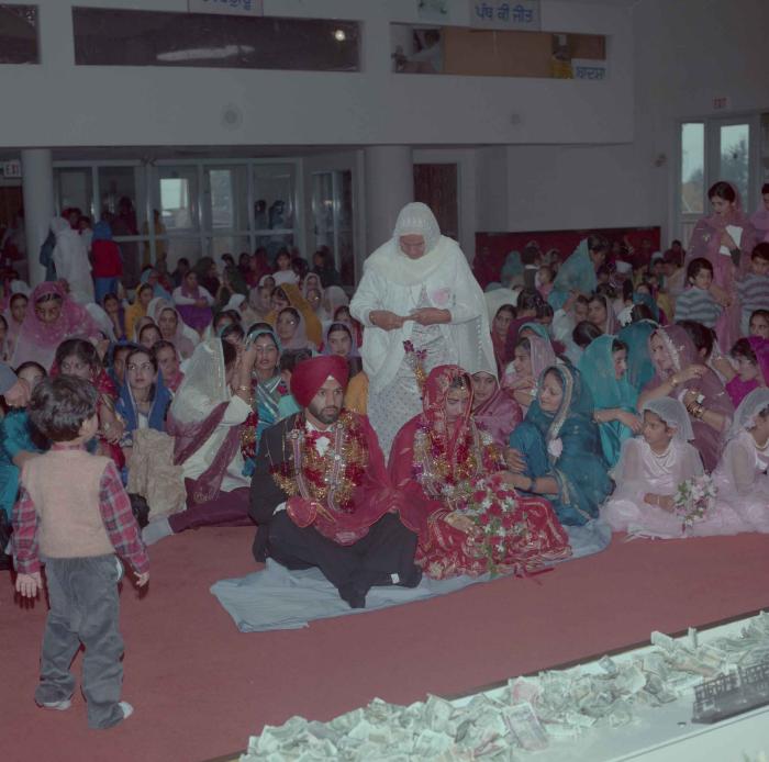 [Photo of Charan Kaila and Karmjit Gill]