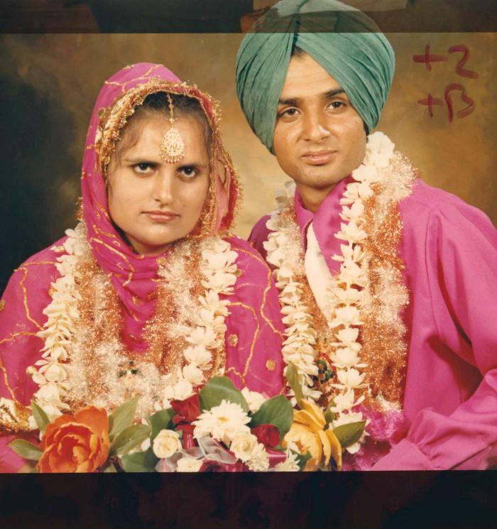 [Photo of Jaginder Singh Gill and Amarjit Gill]