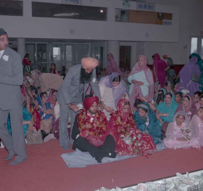 [Photo of Charan Kaila and Karmjit Gill]