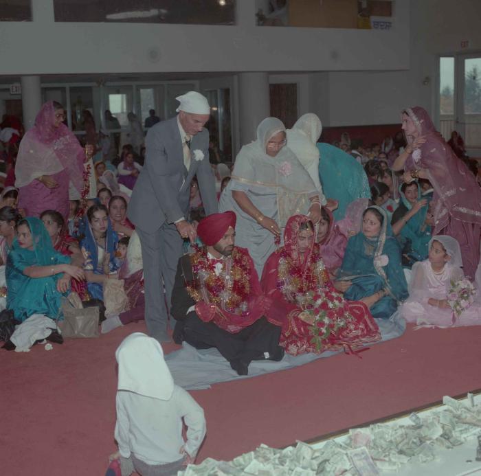 [Photo of Charan Kaila and Karmjit Gill]