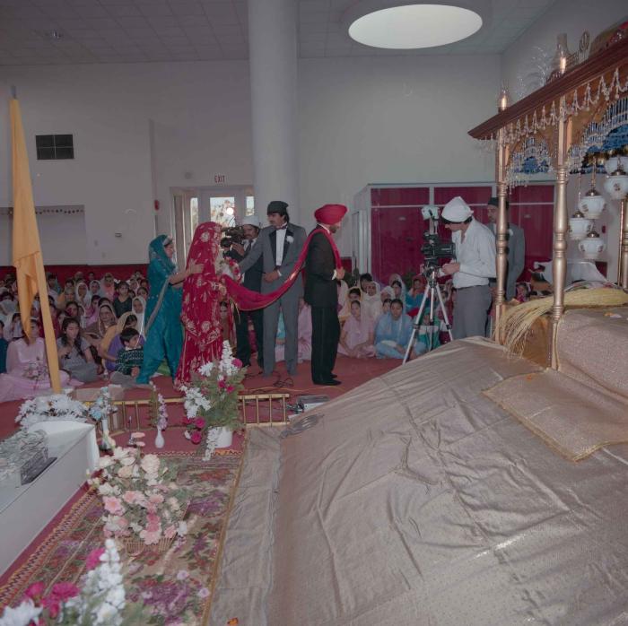 [Photo of Charan Kaila and Karmjit Gill]