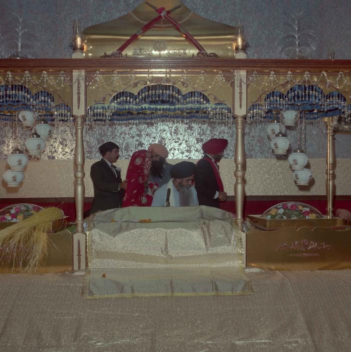 [Photo of Charan Kaila and Karmjit Gill]
