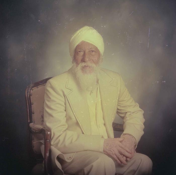 [Photo of an older man]