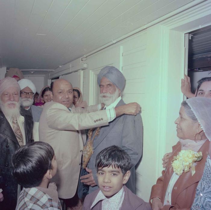 [Photo of unidentified older men]