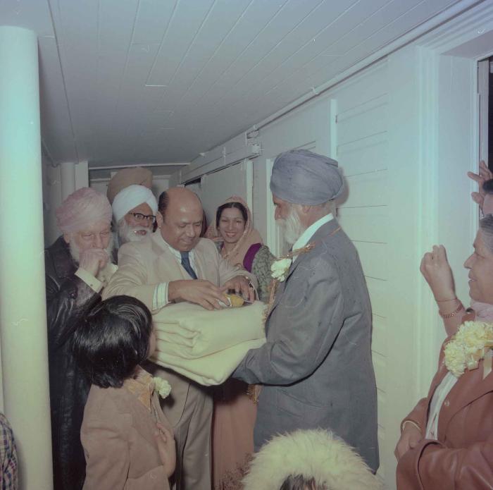 [Photo of unidentified older men]
