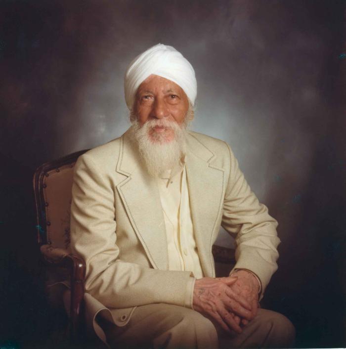 [Photo of an older man]