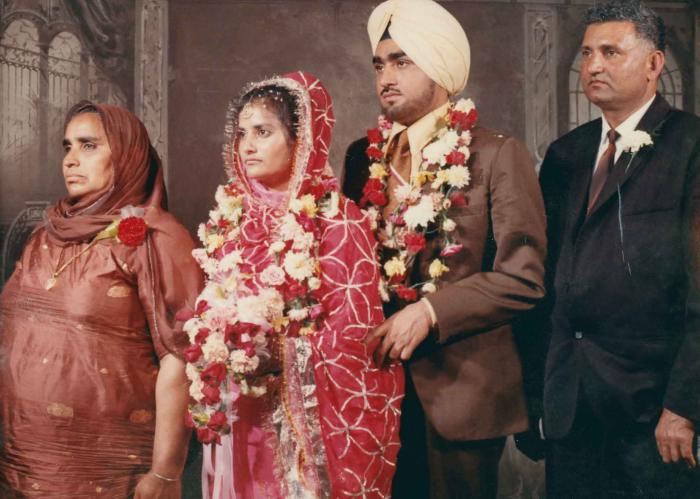 [Photo of Kartar Singh with an unidentified bride and parents]