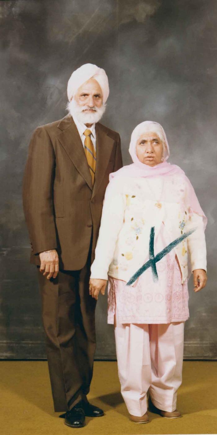 [Photo of an unidentified older couple]