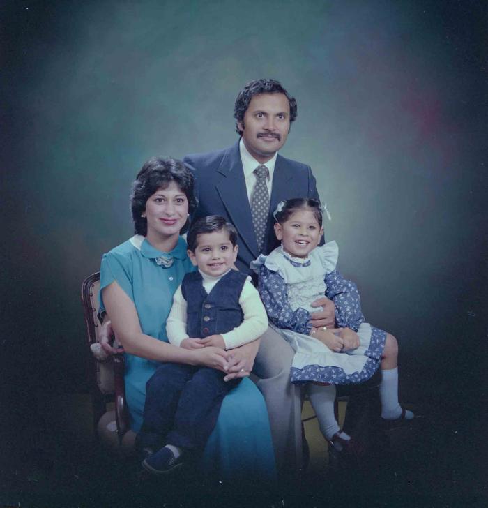 [Family photo of Balbir and Baljit Khagura]