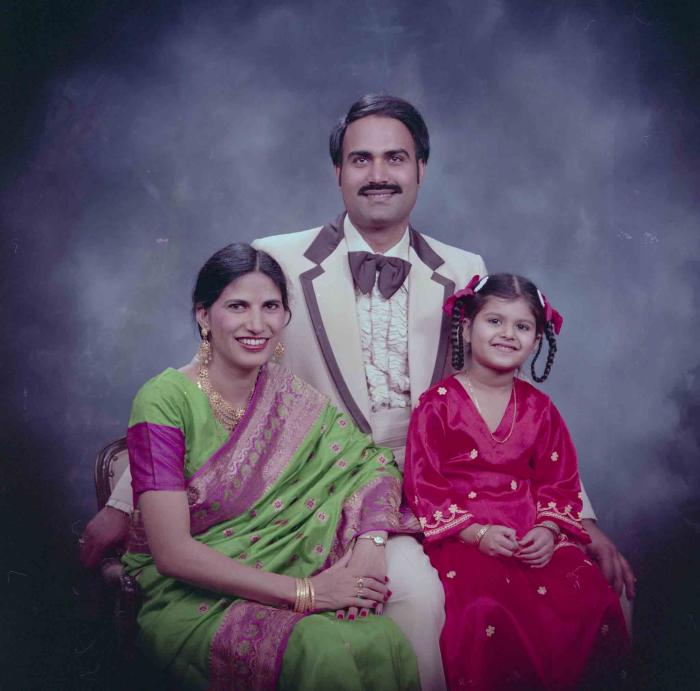 [Photo of Ranjit Kingra with family members]