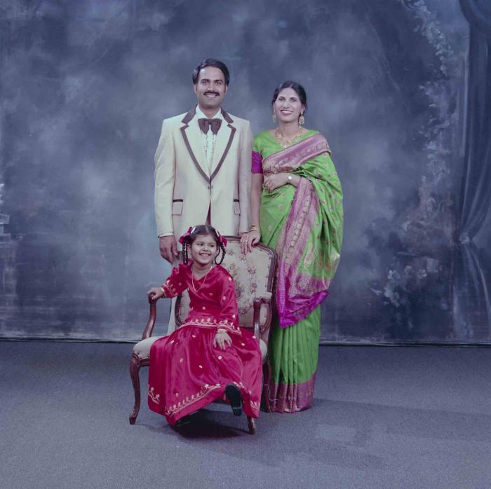 [Photo of Ranjit Kingra with family members]