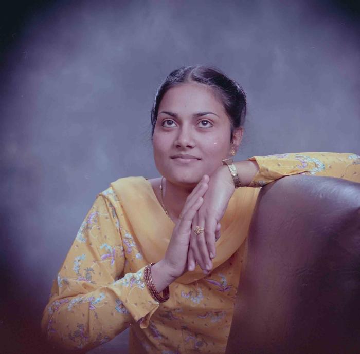 [Photo of Surjit Kingra]