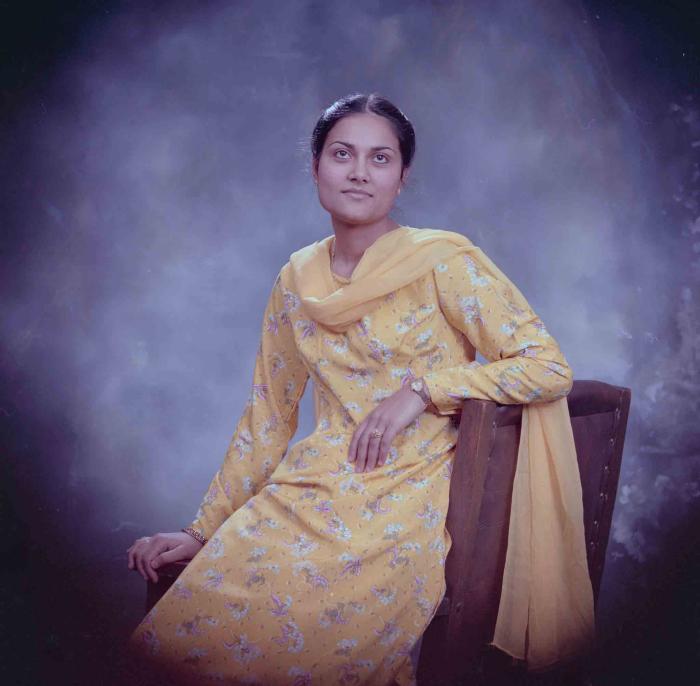 [Photo of Surjit Kingra]