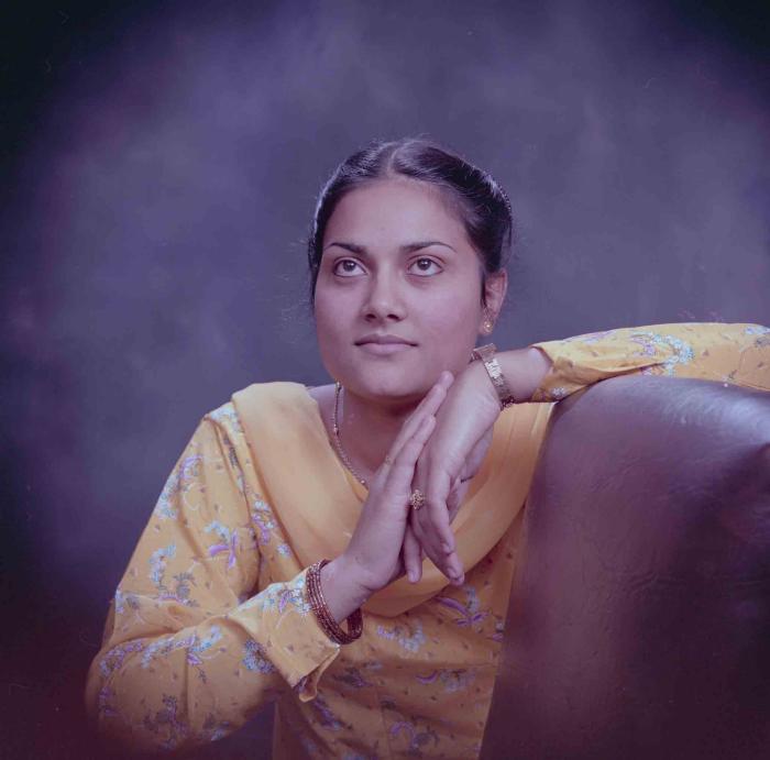 [Photo of Surjit Kingra]