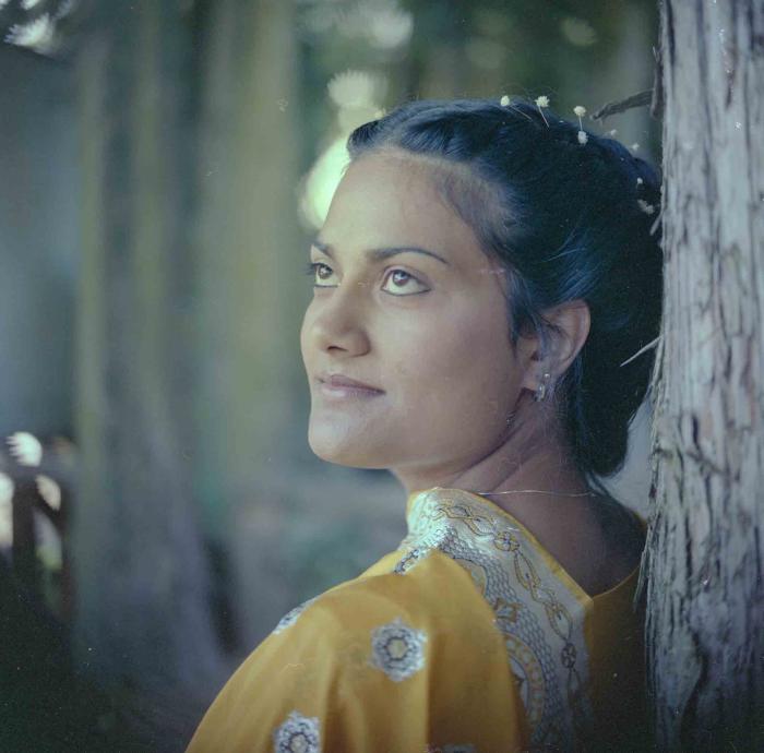 [Photo of Surjit Kingra]